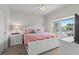 Comfortable bedroom with a bed, a nightstand, a window and a dresser at 10764 70Th Ave # 3206, Seminole, FL 33772
