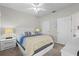 Comfortable bedroom with neutral walls, ceiling fan, and well appointed furniture at 10764 70Th Ave # 3206, Seminole, FL 33772