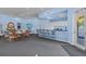 Inviting clubhouse featuring a bar area and ample seating for social gatherings at 10764 70Th Ave # 3206, Seminole, FL 33772