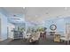 Bright community clubhouse offering various seating options and a bar area at 10764 70Th Ave # 3206, Seminole, FL 33772