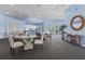 Spacious clubhouse with elegant tables and comfortable seating for residents at 10764 70Th Ave # 3206, Seminole, FL 33772