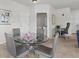 Dining room with a glass table and seating for four at 10764 70Th Ave # 3206, Seminole, FL 33772