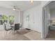 Dining area features modern decor, carpeted floors and easy access to the front door at 10764 70Th Ave # 3206, Seminole, FL 33772