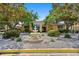 Well-maintained exterior with lush landscaping and a decorative fountain at 10764 70Th Ave # 3206, Seminole, FL 33772