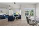 Bright living room with neutral colors and a view of the community at 10764 70Th Ave # 3206, Seminole, FL 33772
