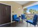 Relaxing front porch with outdoor furniture and a view of the community at 10764 70Th Ave # 3206, Seminole, FL 33772