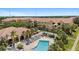 Community pool area with lounge chairs and shade trees, perfect for relaxation and recreation at 10764 70Th Ave # 3206, Seminole, FL 33772