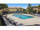 Community pool with plenty of seating for residents at 10764 70Th Ave # 3206, Seminole, FL 33772