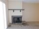 Living room fireplace with stone hearth and a gray mantel, creating a cozy focal point at 111 Lakeview Pl, Oldsmar, FL 34677
