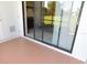 Enjoy the outdoors on this patio with sliding glass doors and outdoor space at 111 Lakeview Pl, Oldsmar, FL 34677
