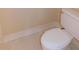 The clean bathroom features a standard white toilet and neutral walls at 111 Lakeview Pl, Oldsmar, FL 34677