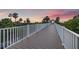 Picturesque boardwalk leading through lush greenery, perfect for a scenic walk at 1180 Gulf Blvd # 402, Clearwater Beach, FL 33767