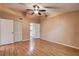 Spacious bedroom features hardwood floors, ceiling fan and double closet at 11800 Park Blvd # 208, Seminole, FL 33772