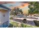 Property features covered car port parking spots with a view of the sunset at 11800 Park Blvd # 208, Seminole, FL 33772