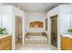 Bright bathroom with tub, shower, and dual vanities at 11938 Royce Waterford Cir, Tampa, FL 33626