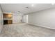 Spacious bonus room with neutral carpet, wet bar, and recessed lighting, perfect for entertaining at 11938 Royce Waterford Cir, Tampa, FL 33626