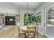 Light-filled breakfast nook overlooks pool and backyard at 11938 Royce Waterford Cir, Tampa, FL 33626