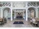 Spacious clubhouse interior with high ceilings, elegant columns, and ample seating, perfect for gatherings and events at 11938 Royce Waterford Cir, Tampa, FL 33626