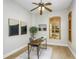 Office with wooden shutters and natural light at 11938 Royce Waterford Cir, Tampa, FL 33626