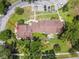 Aerial view of a brown roof home with a landscaped backyard at 13501 Palmwood Ln # 0, Tampa, FL 33618