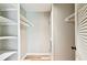 Walk in closet with shelves at 13501 Palmwood Ln # 0, Tampa, FL 33618