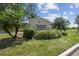 Well-maintained landscaping surrounds the Carrollwood Village Park sign at 13501 Palmwood Ln # 0, Tampa, FL 33618