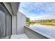 Balcony view with a lake and the property's exterior at 13635 Twin Lakes Ln # 13635, Tampa, FL 33618