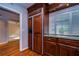 Updated kitchen with wood cabinets, granite countertops, and stainless steel appliances at 13635 Twin Lakes Ln # 13635, Tampa, FL 33618