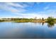 Beautiful lake view showcasing the serene waters and surrounding foliage at 13635 Twin Lakes Ln # 13635, Tampa, FL 33618
