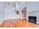 Bright, open-concept living area with a cozy fireplace at 13635 Twin Lakes Ln # 13635, Tampa, FL 33618