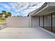 Spacious outdoor patio with sliding glass doors at 13635 Twin Lakes Ln # 13635, Tampa, FL 33618