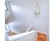 View of stairs with wood floors and lighting at 13635 Twin Lakes Ln # 13635, Tampa, FL 33618