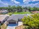 Aerial view of the property, showing the house, yard, and neighborhood at 1406 Valley Pl, Brandon, FL 33510
