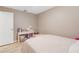 Comfortable bedroom featuring a bed and a table with stuffed animals at 1406 Valley Pl, Brandon, FL 33510