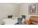 Well-lit dining room with a table set, gray chairs, neutral walls, and marble floors at 1406 Valley Pl, Brandon, FL 33510