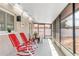 Screened-in patio with outdoor seating and a view of the backyard at 1406 Valley Pl, Brandon, FL 33510