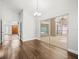 Spacious dining area featuring hardwood floors and sliding glass doors to outdoor area at 14103 Stonebrook Ct, Tampa, FL 33624