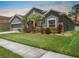 A neatly kept lawn and landscaping surround this home, enhancing its curb appeal and charm at 1517 Yale Castle Ct, Ruskin, FL 33570