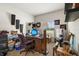 Functional home office with a wooden desk, comfortable chair, and natural light from the window at 1517 Yale Castle Ct, Ruskin, FL 33570