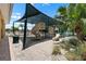 Community playground featuring covered play structure with slides, swings, and sandy play area at 1517 Yale Castle Ct, Ruskin, FL 33570