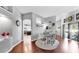 Bright dining room with hardwood floors and open access to other living spaces at 16928 Hawkridge Rd, Lithia, FL 33547