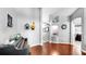Open-concept dining room with hardwood floors and a piano at 16928 Hawkridge Rd, Lithia, FL 33547