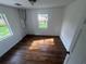 Cozy bedroom with natural light and hardwood floors at 18127 Us Highway 41, Spring Hill, FL 34610