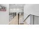 View of the stairs and banister on the second floor at 18824 Birchwood Groves Dr, Lutz, FL 33558