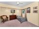 Cozy bedroom with natural light, comfortable furnishings, and a relaxing atmosphere at 1948 Elaine Dr, Clearwater, FL 33760