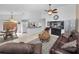 Open-concept living room with dining area and a view into the kitchen at 1948 Elaine Dr, Clearwater, FL 33760