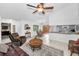 Open-concept living room with dining area and a view into the kitchen at 1948 Elaine Dr, Clearwater, FL 33760