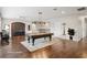 Staged game room boasts a pool table and hardwood floors at 19711 Wellington Manor Blvd, Lutz, FL 33549