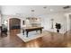 Staged game room boasts a pool table and hardwood floors at 19711 Wellington Manor Blvd, Lutz, FL 33549