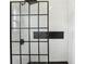 Modern walk-in shower featuring white subway tile, a black grid shower door, and hexagon tile accents at 19711 Wellington Manor Blvd, Lutz, FL 33549